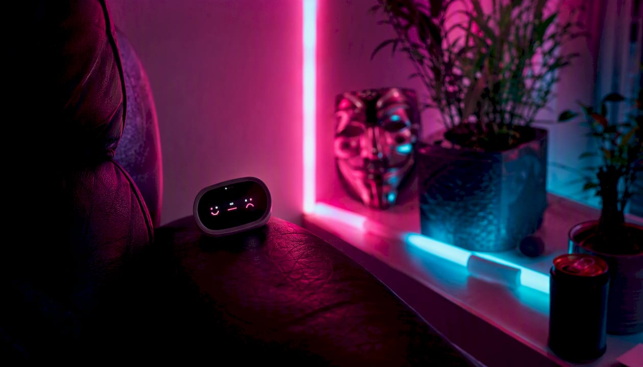 Neon-lit room with mood check device close-up