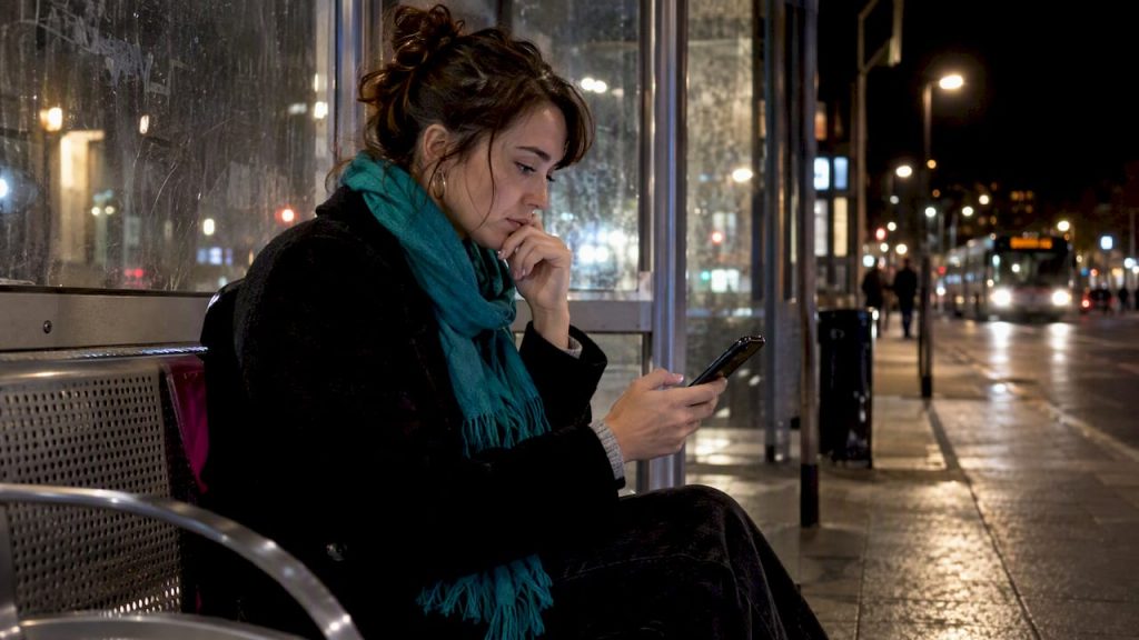 AI Companion Boundaries: Set Limits Before Chats Feel Personal Person pausing before sending a personal chat